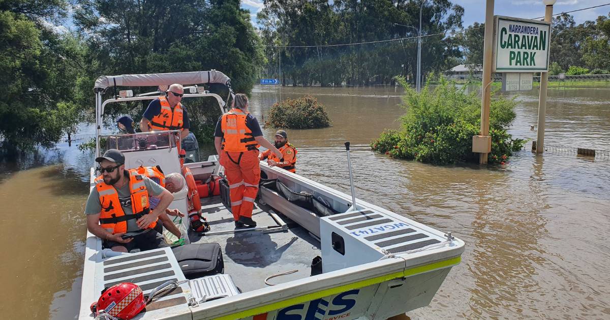 Town suffers as floods contaminate water supply and stop tourists