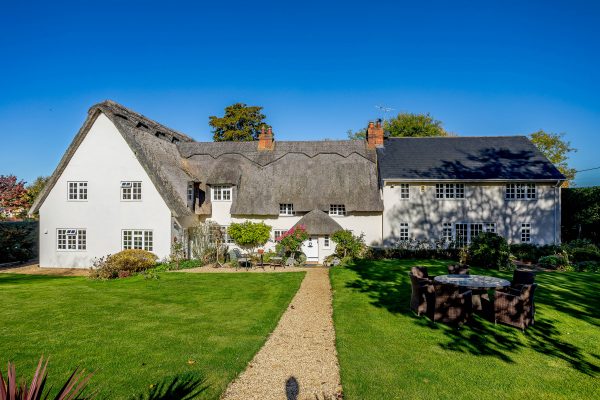 A spectacularly renovated thatched home in a picture-perfect Northamptonshire village