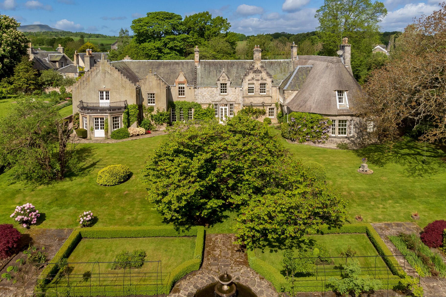 Sir Walter Scott’s delightful thatched home just outside Edinburgh has come up for sale