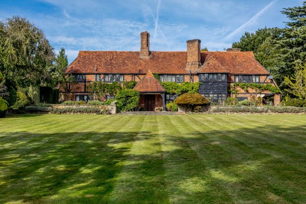 A beautiful medieval-style house and estate in the heart of Surrey’s ‘Golden Triangle’