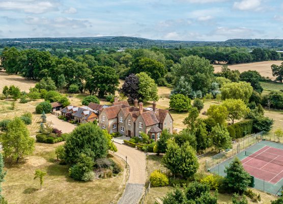 A glorious country house with library, gym and treehouse, in a hamlet a stone’s throw from Guildford