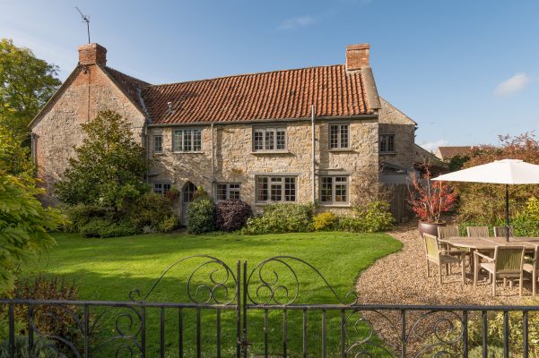 A 13th-century grange for sale with stone floors, open fires and gothic arches for doorways