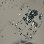 Three in four homes in Qld town damaged by flood