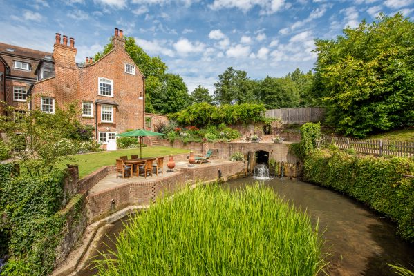 ‘Everyone who visits falls in love’ with this divine Georgian house on the banks of a mill pond in Surrey