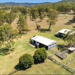 ‘Inside-out living’ at this modern take on the Arts-and-Crafts house, with exotic curves, glass walls and spectacular country setting