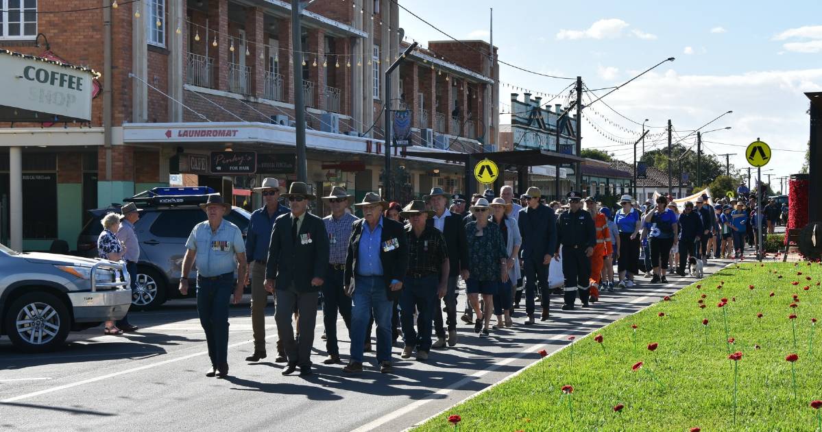 Crowds take to streets around north west Queensland for Anzac Day