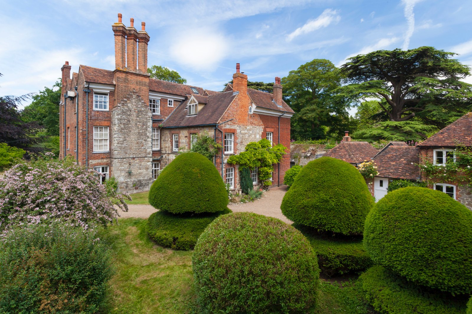 A delightful home that needs saving in the Kent Downs, surrounded by the ruins of a medieval monastery