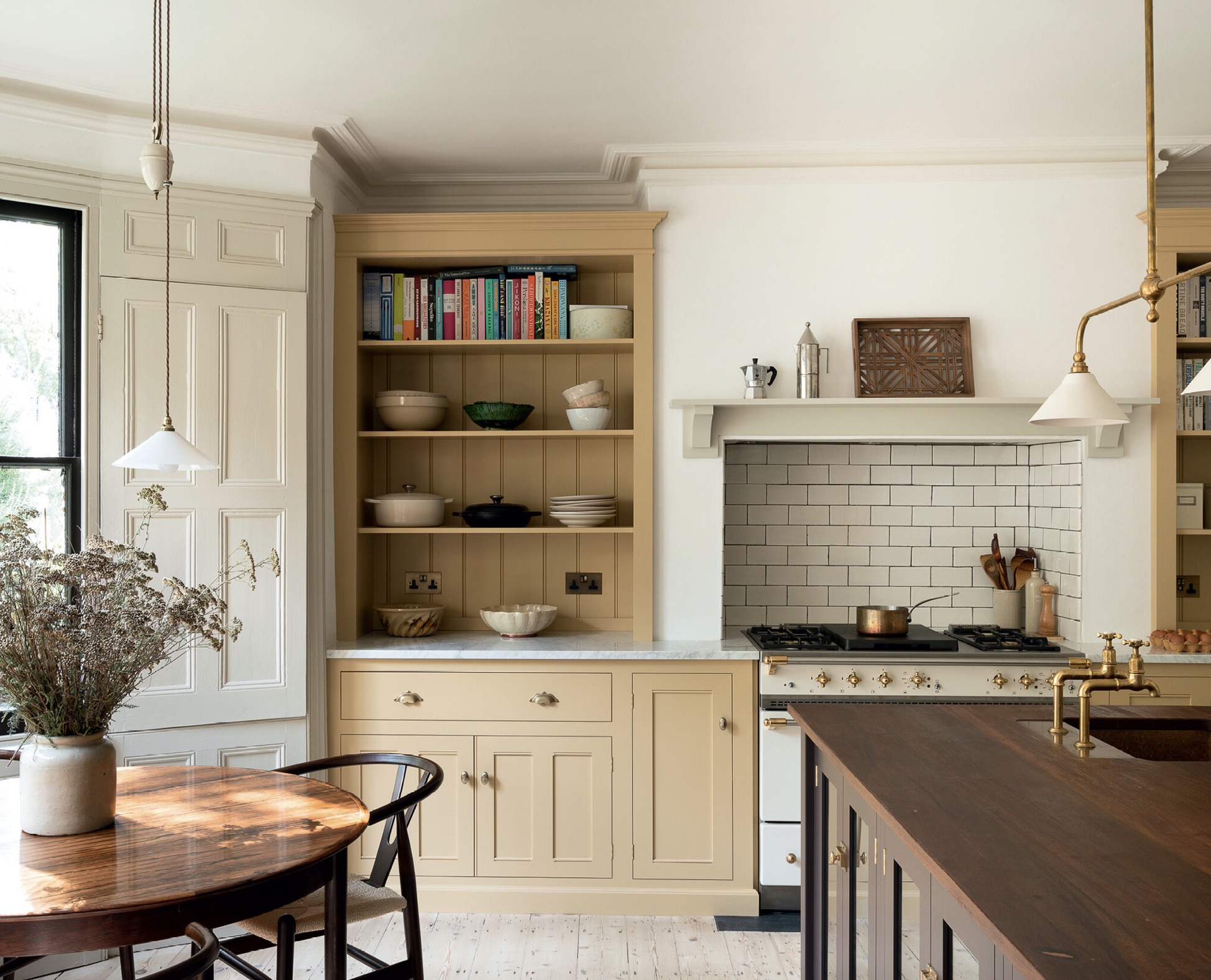 A London townhouse kitchen transformed to be sociable, practical and charming