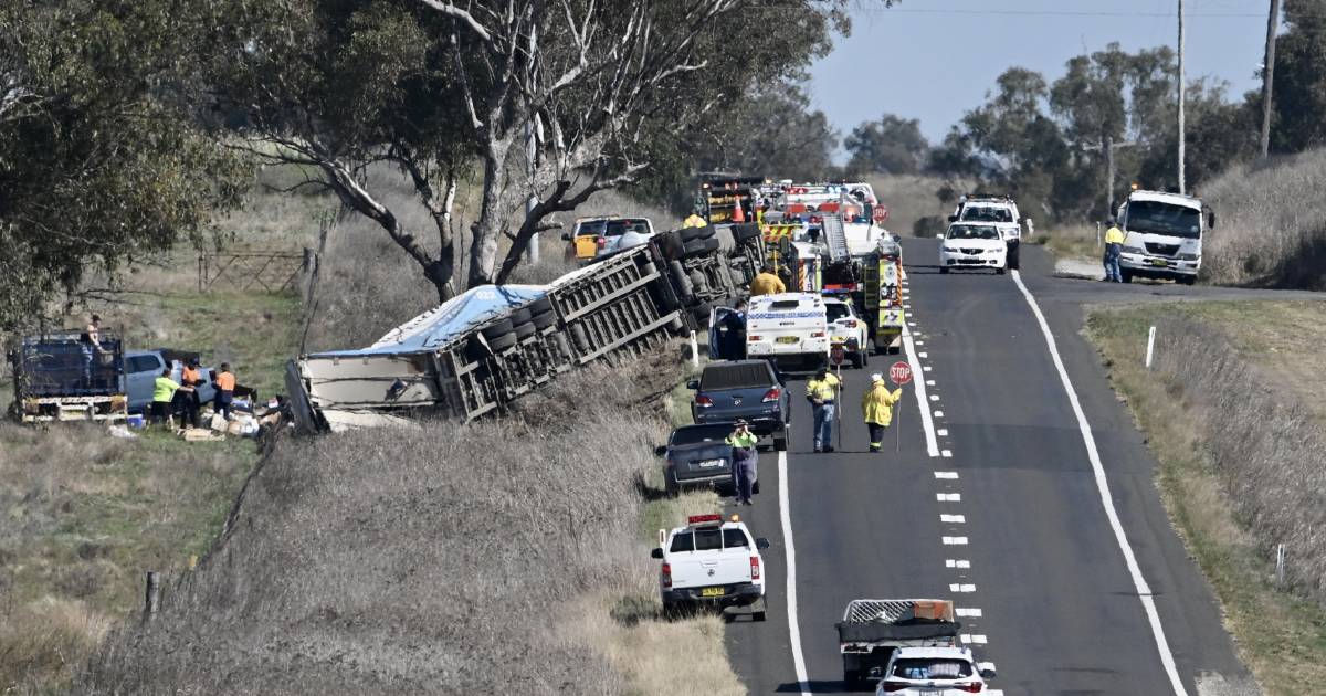 Driver treated for shock after truck rolls off highway near Tamworth