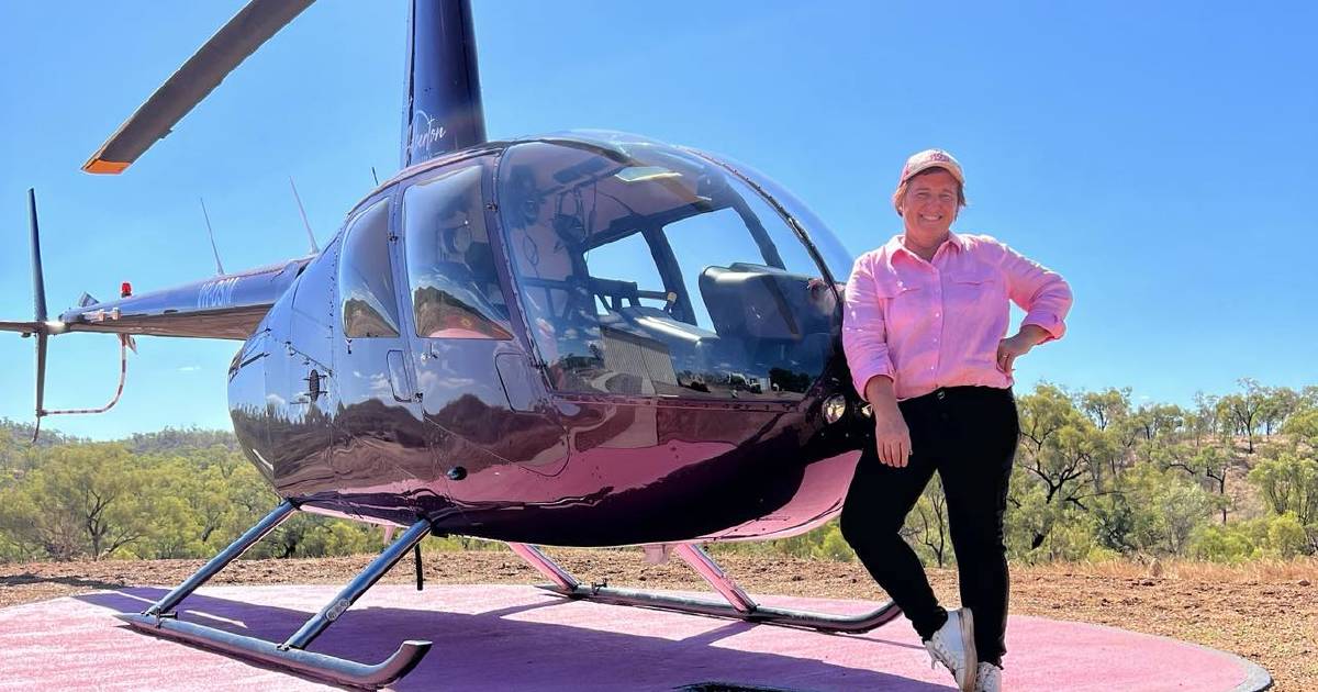 Barbie invited to chopper into pink heart helipad