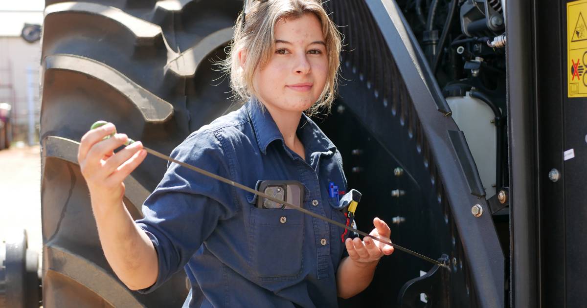 Emerald girl trades diamonds for tractor grease