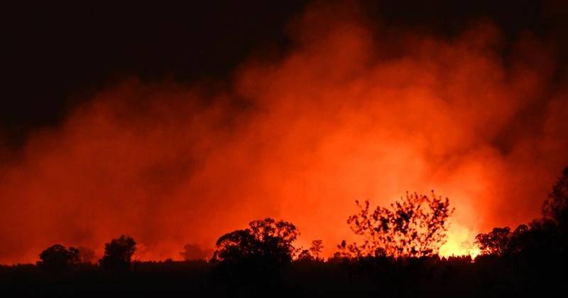 Queensland bushfire threat eases but 80 still burning