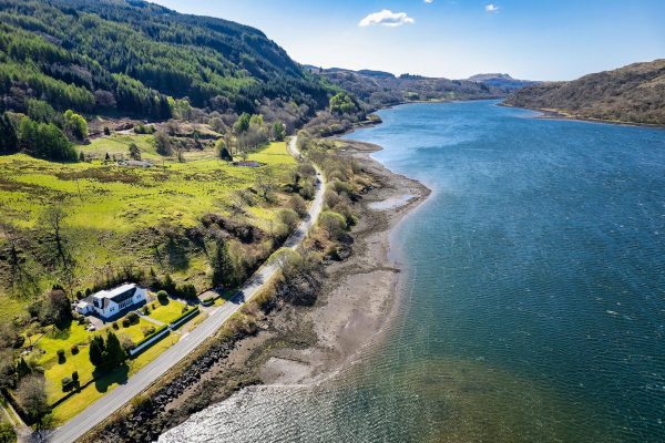 A bewitching and idyllic Scottish retreat clinging to the water’s edge