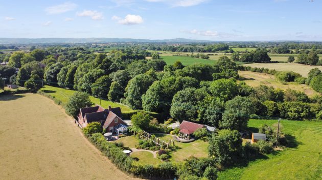 A charming Cotswolds cottage with huge amounts of space and fine gardens, nestled in rolling countryside