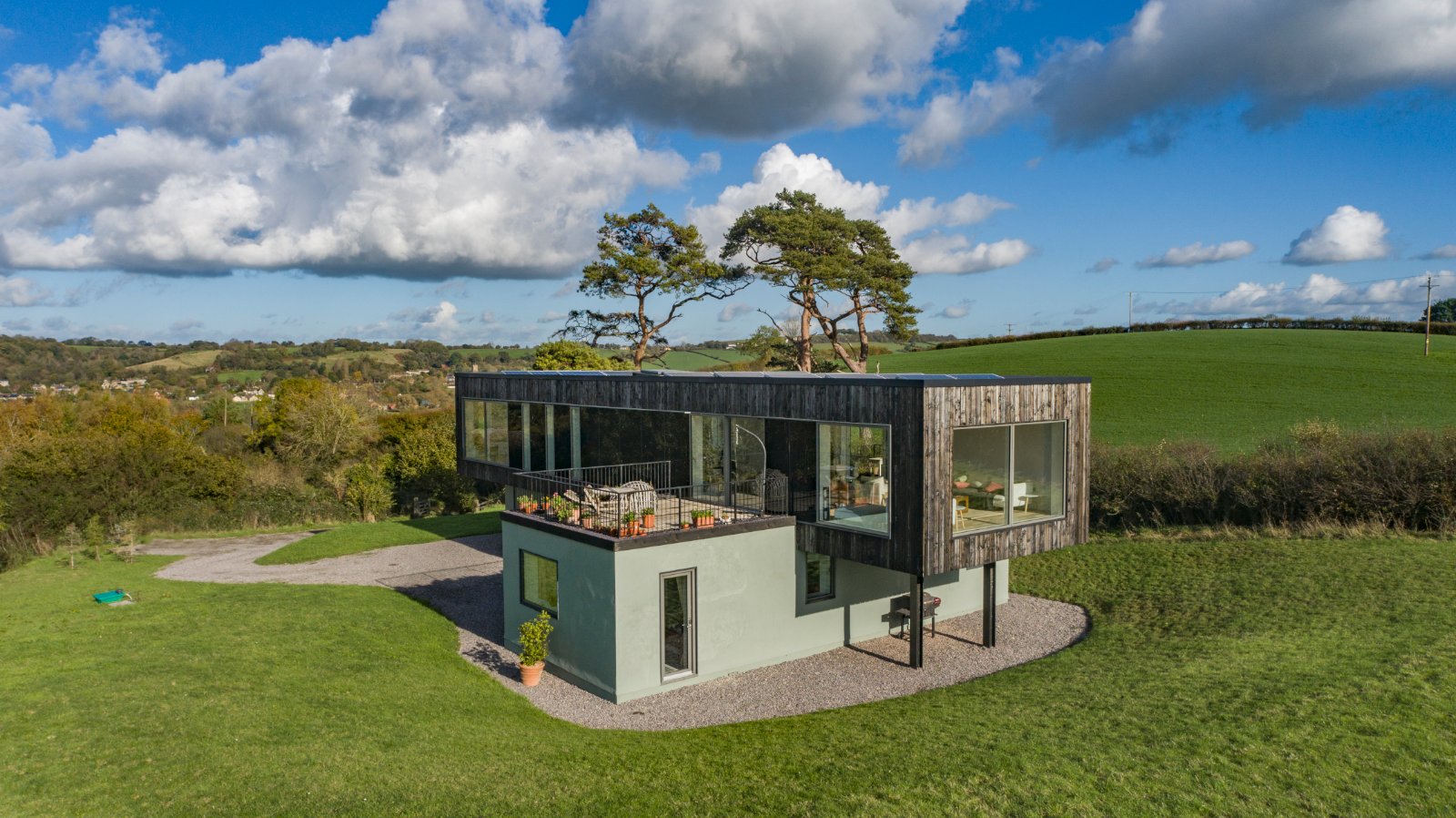 The good life meets modern luxury? This glass-clad eco home will make you wonder what a country house should be