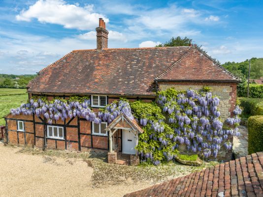 A magical, wisteria-clad farmhouse in West Sussex where the horses are catered for every bit as well as the human residents