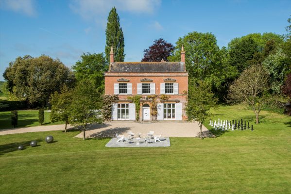 A picture-perfect Georgian manor with striking 1960s interiors which you have to see to believe