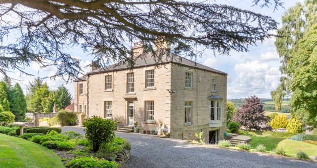 A classic Georgian country house that’s perfectly secluded amid woodland, orchards and lawns