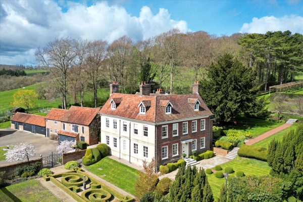 An eight-bedroom Queen Anne home in Hertfordshire with perfect gardens and a party barn