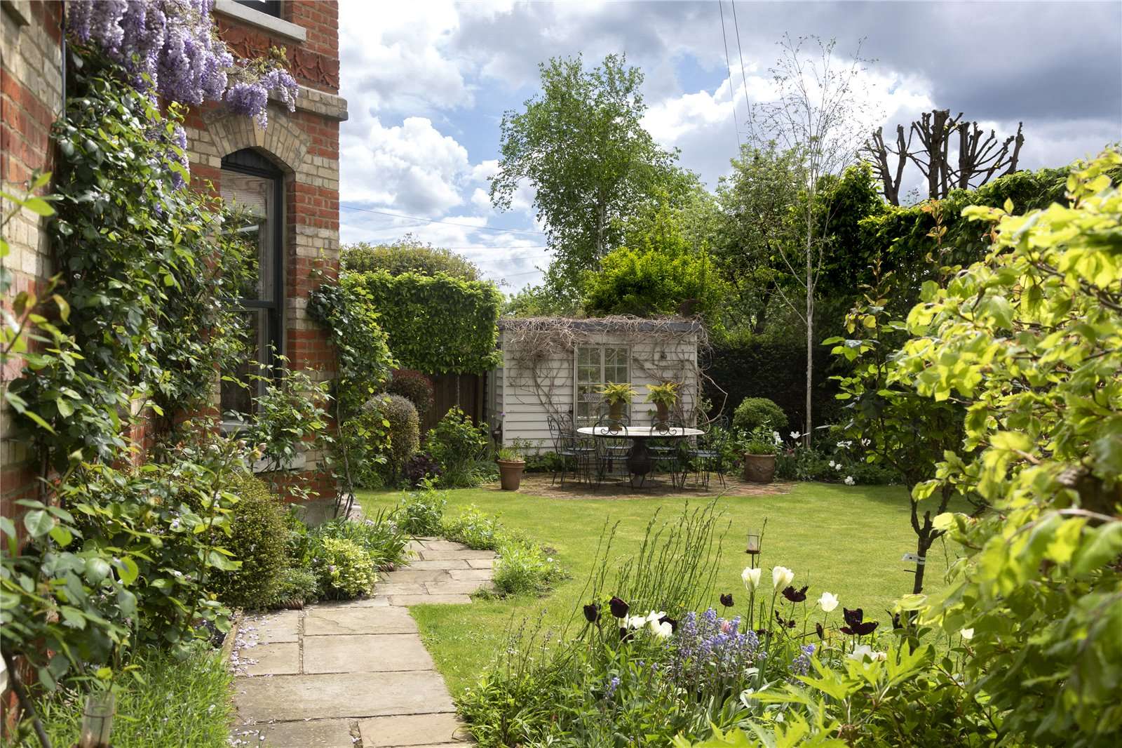 A bona fide country house in London, complete with a coach house, gardens, and an Aga in the kitchen