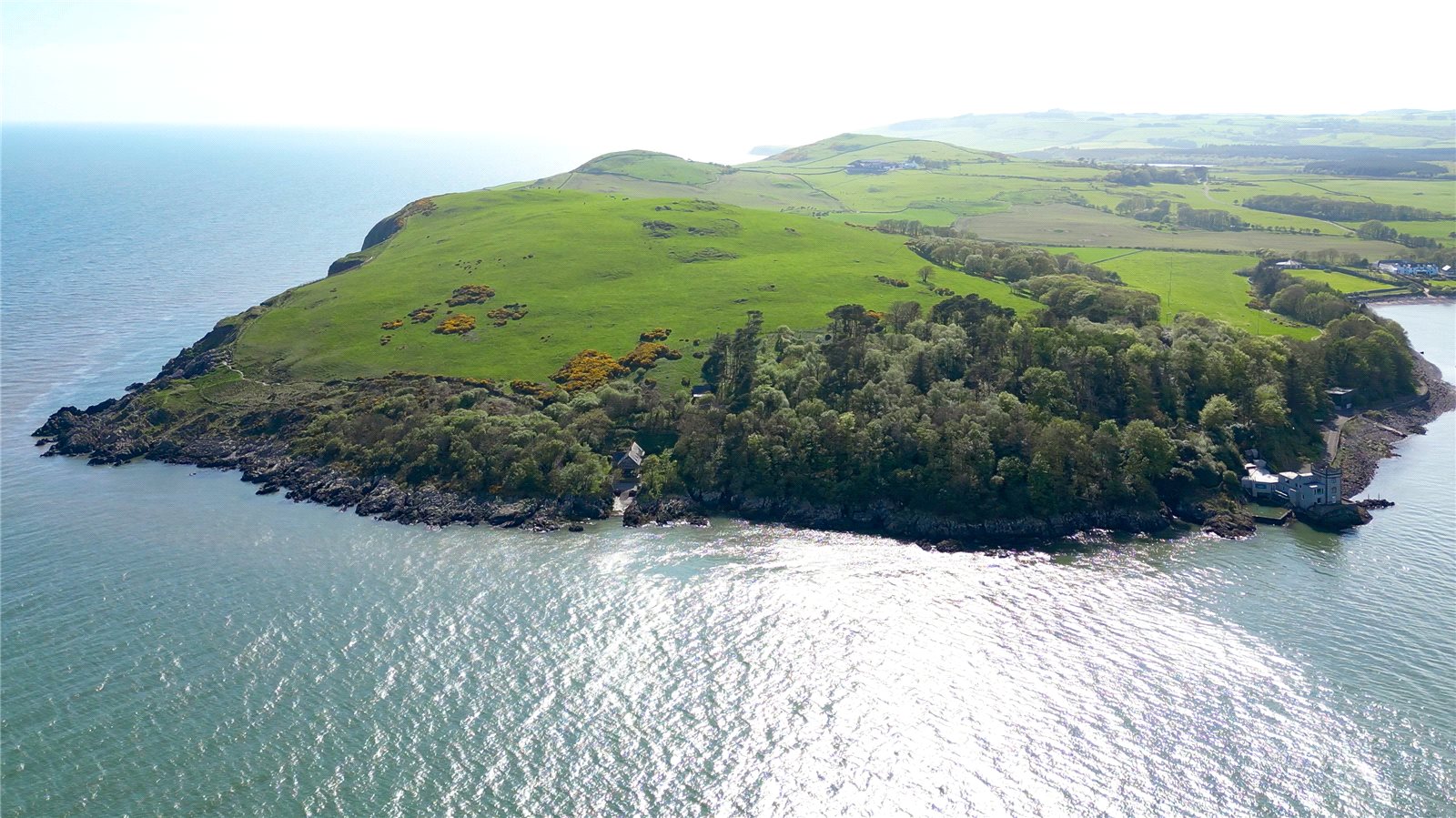 A former lifeboat station in an incredible spot, with four bedrooms, six acres and red squirrels dancing on the decking