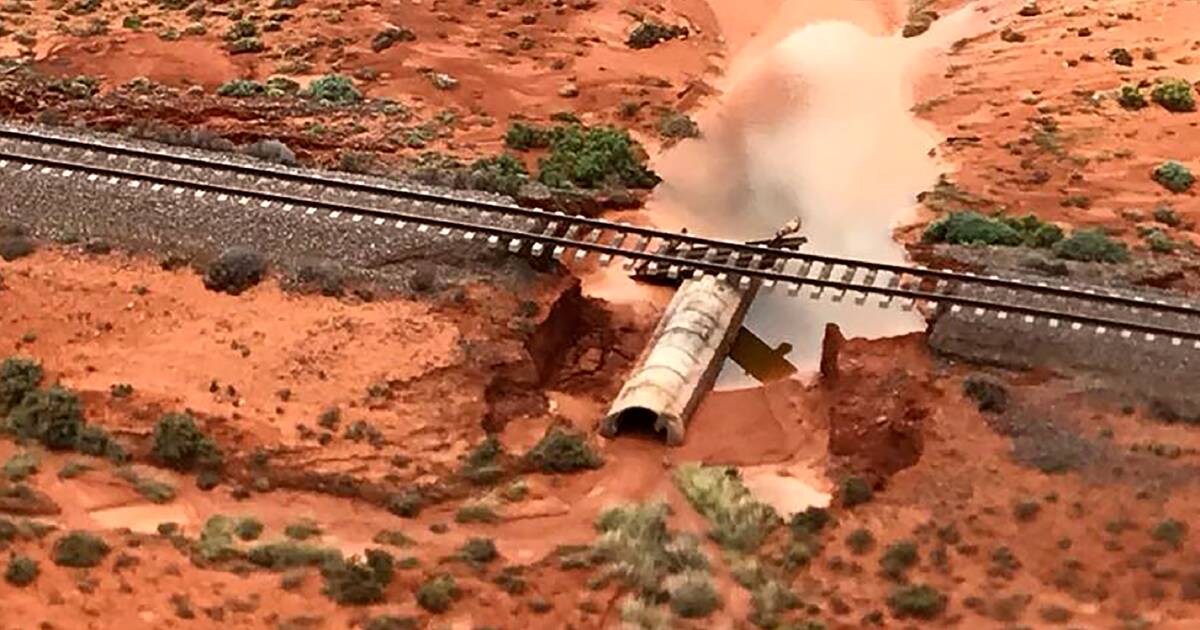 Vital east-west highway and rail line cut by outback floods